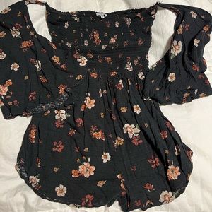 TOBI size medium romper. Flowy off the shoulder sleeves. Good condition.